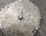 A picture of step 5 of Masala Oats Idly.