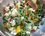 A picture of step 1 of Cheesy Mix veggies in white sauce.