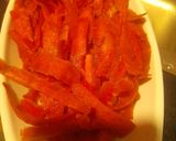 A picture of step 2 of Gajar ka halwa with peels.