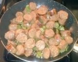 A picture of step 10 of Rigatoni w/ Green Peppers, Italian Sausage and Garlic.