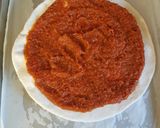 A picture of step 11 of Completely homemade chicken madras pizzas.