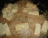 A picture of step 3 of Stir-fried Shirataki, Tofu and Tarako.