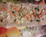 A picture of step 4 of Bread pin wheel sandwich.