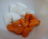 A picture of step 3 of Simmered Daikon Radish, Carrot, Shiitake Mushrooms and Aburaage.