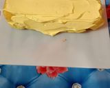 A picture of step 8 of Mango Swiss roll.