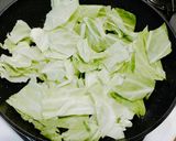 Foto langkah ke 5 dari resep Ayam Koloke Saus Tiram tumis sayur Kubis.