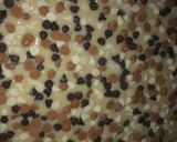 A picture of step 3 of 30 minute Magic cookie bars.