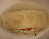 A picture of step 6 of Cheesy Enchiladas.