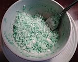 A picture of step 13 of Coconut Cake Roll with Key Lime Cream Filling.