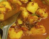 A picture of step 10 of Luchi & Alur Dom / Puri with Potato Curry.