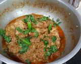 A picture of step 9 of Bhounwa kadu chicken.