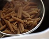 A picture of step 4 of Spotted Trotter Sausage, Crisp Apple and Kale Pasta in Cream Sauce.