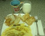 A picture of step 9 of Easy Cheesy Cheesesteak Omelet.
