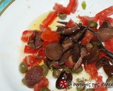 A picture of step 2 of Spaghetti with raw tomato and olives.