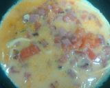 A picture of step 3 of Good breakfast ham and tomato omelette with hash brown.
