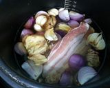 A picture of step 2 of Ginger And Onion Pork Soup /Broth /Stock.