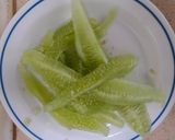 A picture of step 1 of Spicy cucumber.