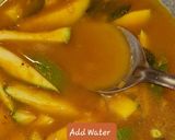 A picture of step 4 of Meen manga curry or raw mango fish curry.
