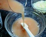 A picture of step 3 of Jiggly Grapefruits Jello.