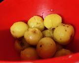 A picture of step 1 of Amla ka meetha achaar (Indian gooseberry sweet pickle).