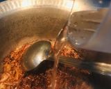 A picture of step 2 of Chicken aalu salan.