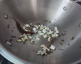A picture of step 2 of Traditional Bengali Narkol Diye Bhaja Moong Dal.