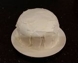 A picture of step 24 of Vanilla Layer Cake with Lemon Cream Filling and Lemon Whipped Cream Frosting.