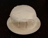 A picture of step 24 of Vanilla Layer Cake with Lemon Cream Filling and Lemon Whipped Cream Frosting.
