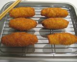 A picture of step 8 of Deep-fried and Breaded Chicken Rolls with Cheese.