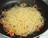 A picture of step 7 of Tomato and Camembert Cheese Pasta.