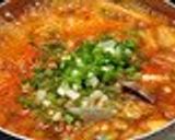 A picture of step 5 of Kimchi Soup with Tofu and Asari or Manila Clams.