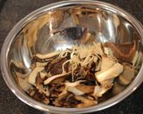A picture of step 7 of Mushrooms and Chestnuts in Autumn-Coloured Paella.