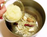 A picture of step 4 of Our Family Recipe for Coconut Milk Curry.