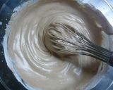 A picture of step 3 of Chocolate Cream Biscuit Cake.