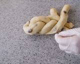 A picture of step 12 of Soft Chewy Braided Raisin Bread.