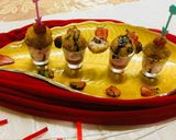 A picture of step 7 of Vermicelli PASTA bombs served with Strawberry custard sauce.