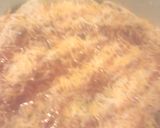 A picture of step 8 of Mins yummy enchilada casserole.