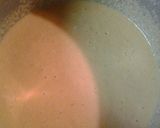 A picture of step 2 of Cheesy cornbread in a cast iron pan.
