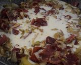 Foto del paso 3 de la receta: Guisantes y patatas salteados con jamón y ajos tiernos