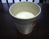 A picture of step 1 of Piping Hot! Honey and Ginger Milk.