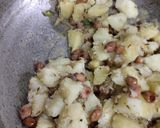 A picture of step 4 of Sawan special Potatoes.