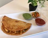 A picture of step 9 of Stuffed Tandoori Besan Chilla.