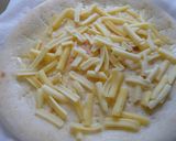A picture of step 9 of Rice Flour Pizza Crust.