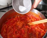 A picture of step 8 of Eggs a la Flamenca.