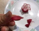 A picture of step 1 of Radish Flower⚘.