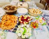 A picture of step 11 of Dal Maharani,Mughlai Shahi Paneer,mirchi parathas.