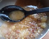 A picture of step 6 of Vickys Seared Duck Legs with Pear and Cranberry Gravy.