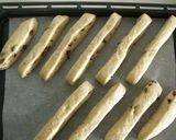 A picture of step 9 of Chocolate Banana Stick Bread Rolls.