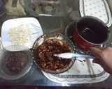 A picture of step 2 of Chocolate Ice-cream biscuit cake.