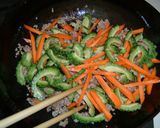 A picture of step 4 of Goya Champuruu - Okinawan Bitter Melon Stir-Fry with Somen Noodles.